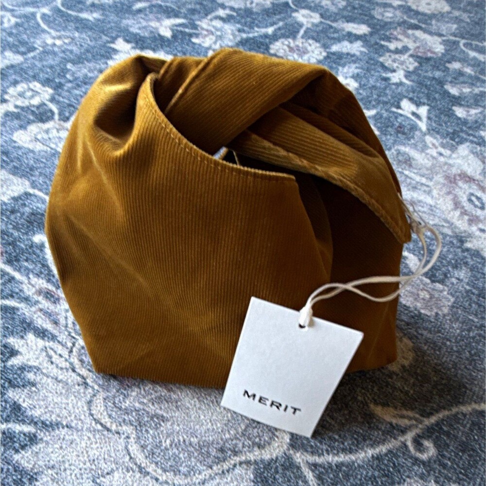 Merit Beauty signature corduroy tie-top makeup bag in a warm brown NWT